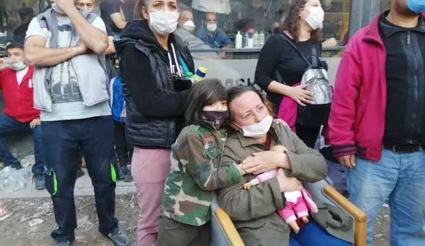 izmir earthquake mother waits for her 4 daughters to be rescued with a baby toy in her hand